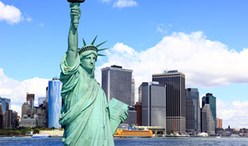 City skyline behind Statue of Liberty